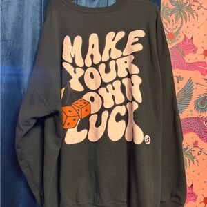 Dressed in LALA Black Sweatshirt with Pink Slogan & Orange Dice